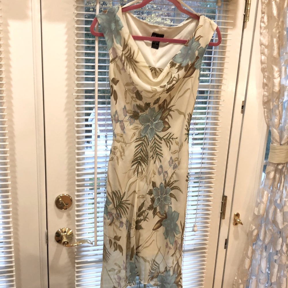 Gorgeous beaded Dress for any occasion A-line fit ,cow neck drape. Stunning